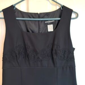 John Roberts basic black dress